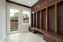 Elegant custom wardrobe in a hazelnut color, featuring spacious, modern cabinets.            