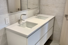 a small custom vanity with two rectangular sinks - angle view